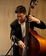 Playing contrabass/double bass